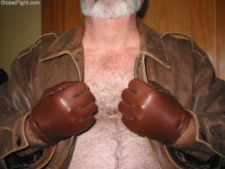 wrestlerswrestlingphotos:  polarbear silverdaddie wearing leather gloves  This picture pushes a lot of buttons for me ;)