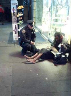 itsdivaduh:  zombridiaries:  whatifeverythingisadream-deacti: This NYC cop saw a homeless man outside of the shoe store, knowing the weather was cold and getting worse he went inside to buy a pair of boots for the man.This cop deserves some respect. 