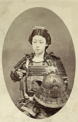 justamus:  A rare vintage photograph of an onna-bugeisha, one of the female warriors of the upper social classes in feudal Japan. Often mistakenly referred to as “female samurai”, female warriors have a long history in Japan, beginning long before